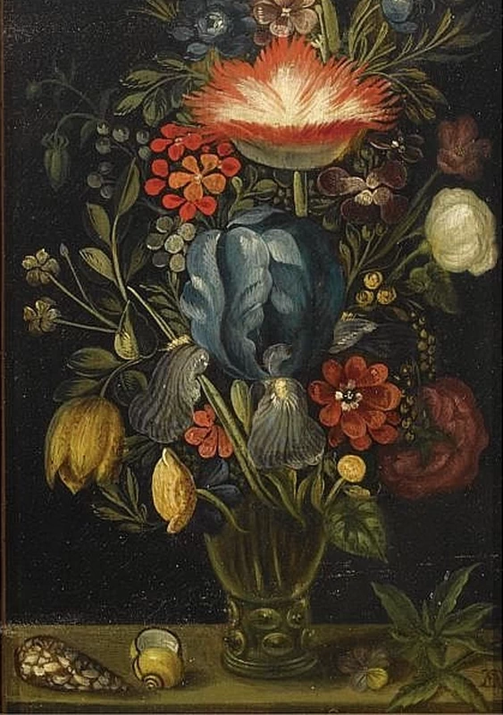 Una natura morta con vari fiori in un vaso